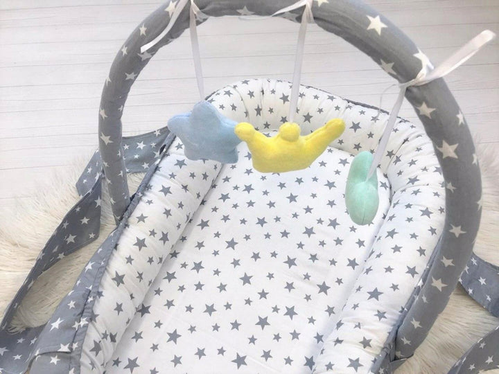 Кокон-мобіль - стильний і зручний дитячий аксесуар для сну