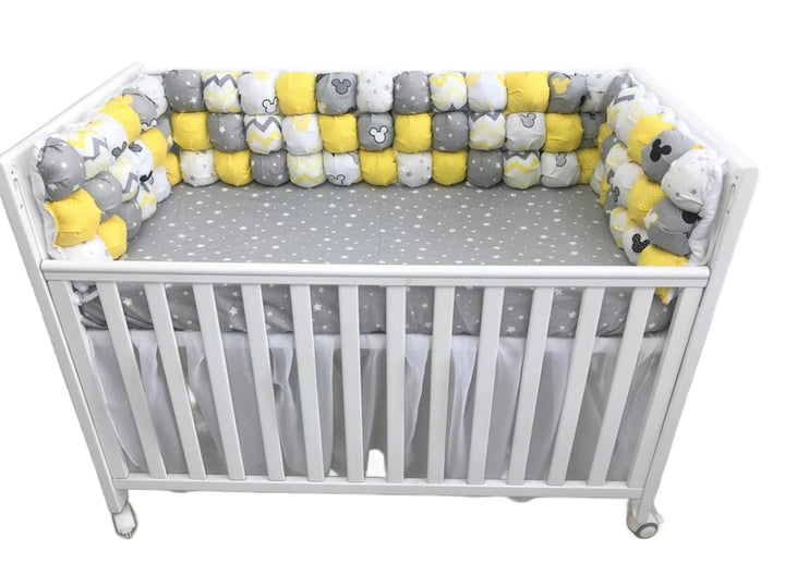 Бортики набори - Комплект м'яких та безпечних бортиків для дитячого ліжечка, що забезпечує захист та комфорт немовляті."