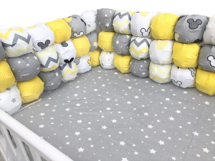 Бортики набори - Комплект м'яких та безпечних бортиків для дитячого ліжечка, що забезпечує захист та комфорт немовляті."