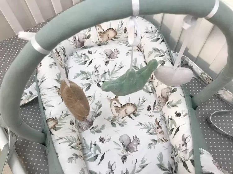 Кокон-мобіль - стильний і зручний дитячий аксесуар для сну