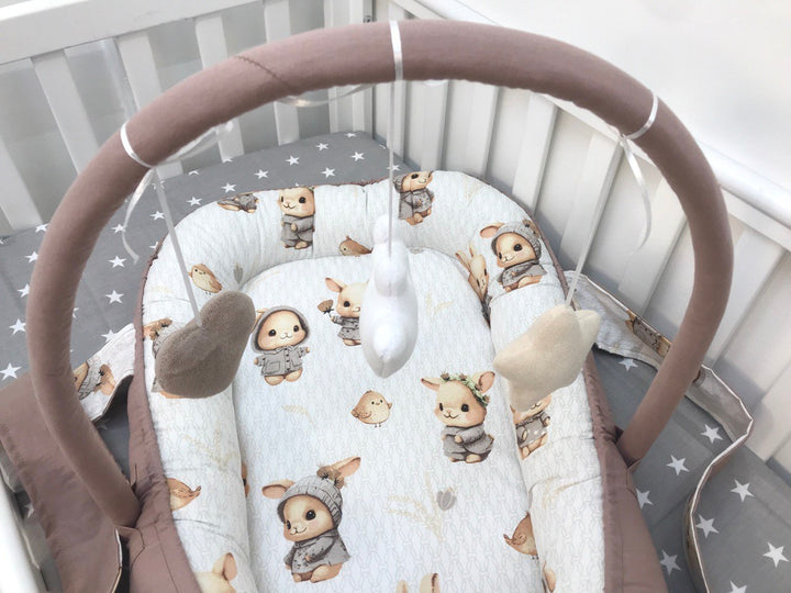 Кокони для немовлят для комфортного сну і безпеки новонароджених