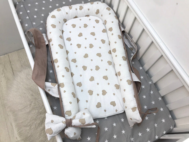 Кокони для немовлят для комфортного сну і безпеки новонароджених