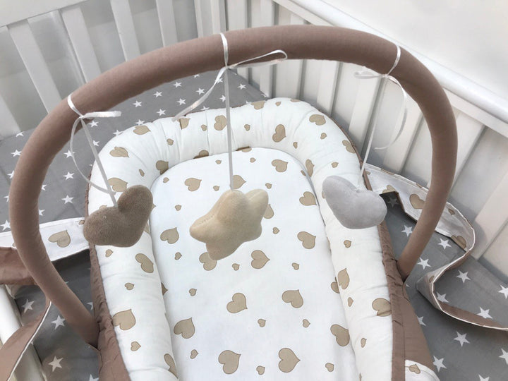Кокони для немовлят для комфортного сну і безпеки новонароджених