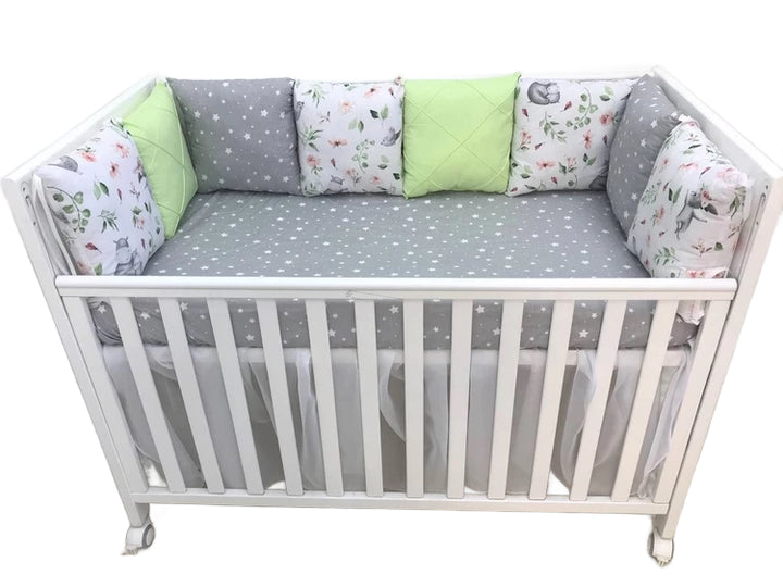 Бортики набори - Комплект м'яких та безпечних бортиків для дитячого ліжечка, що забезпечує захист та комфорт немовляті."