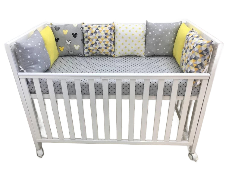 Бортики набори - Комплект м'яких та безпечних бортиків для дитячого ліжечка, що забезпечує захист та комфорт немовляті."