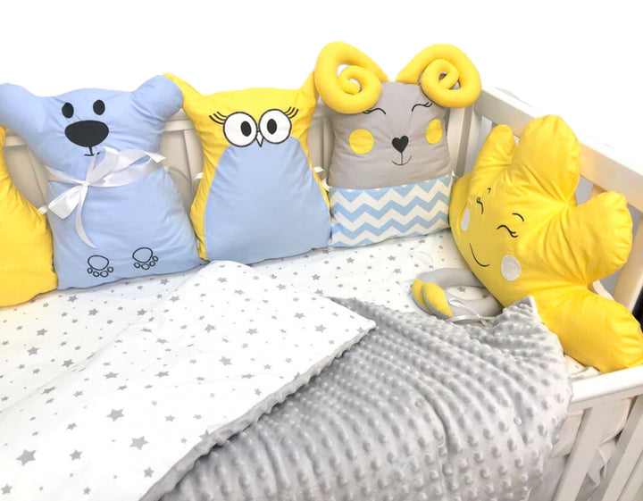 detskiy-postelnyy-nabor-s-bortikami-v-krovatku-krasota