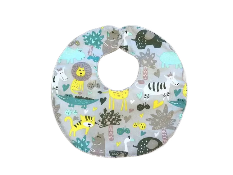 Яскраві дитячі непромокаючі слюнявчики для годування та захисту одягу