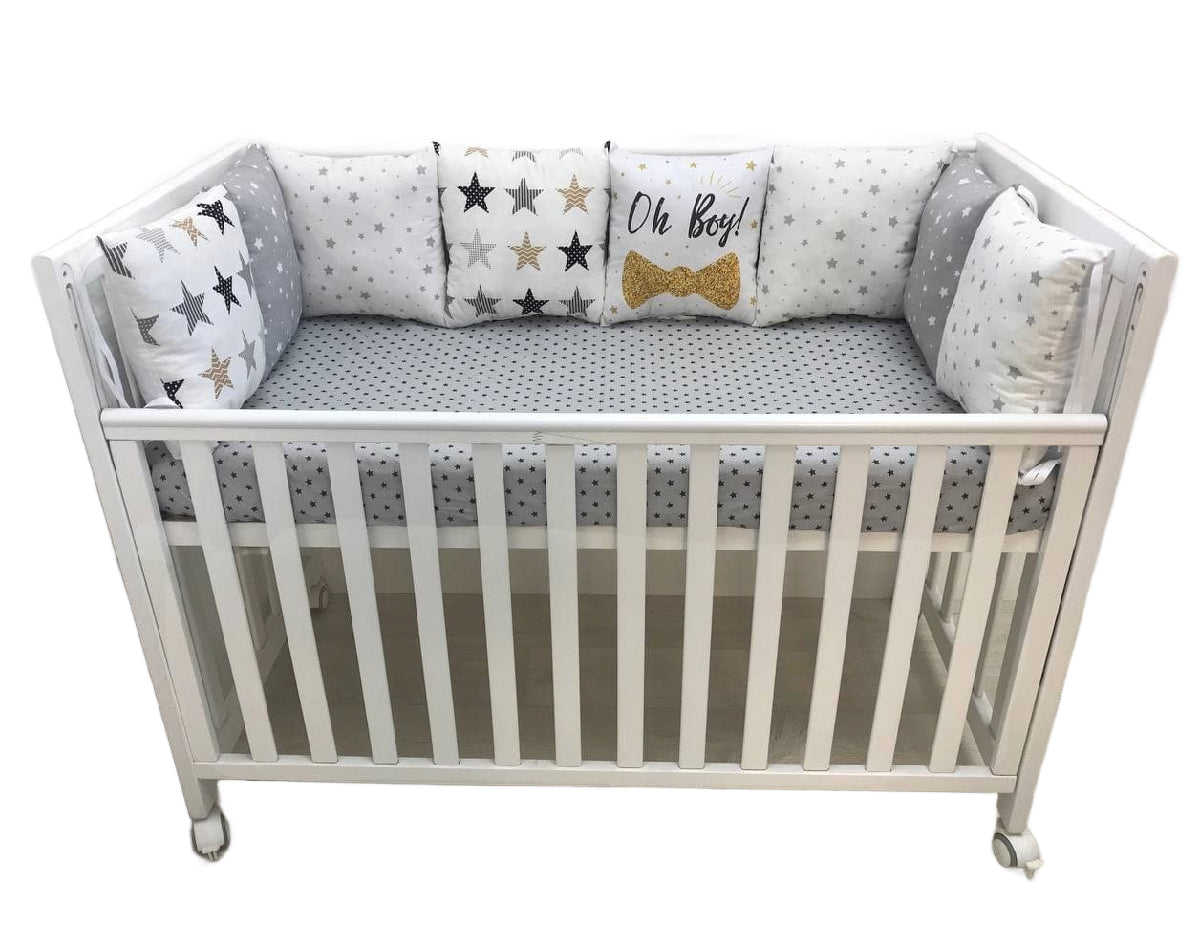 Бортики набори - Комплект м'яких та безпечних бортиків для дитячого ліжечка, що забезпечує захист та комфорт немовляті."