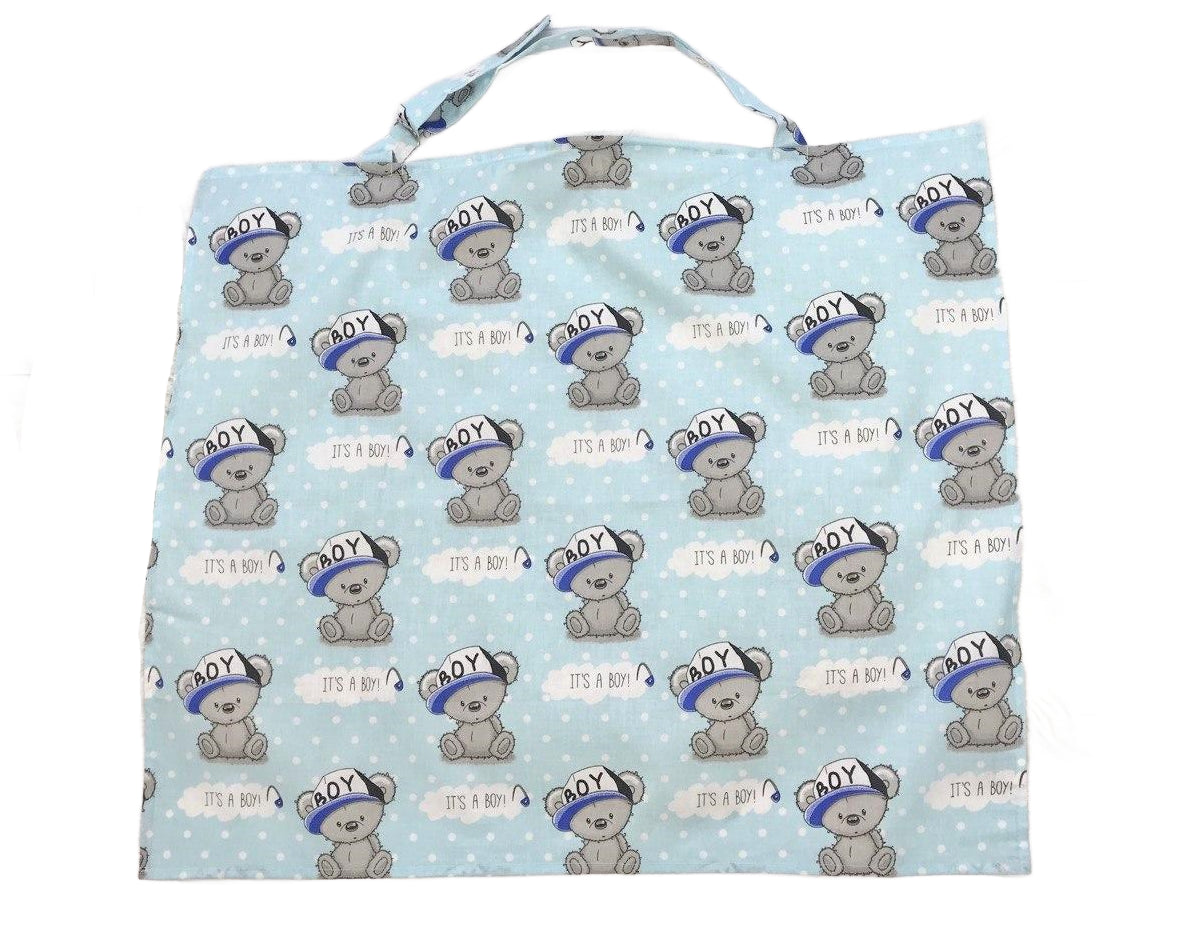 Жінка використовує стильну та зручну накидку для годування, що забезпечує комфорт та конфіденційність під час грудного вигодовування на природі.