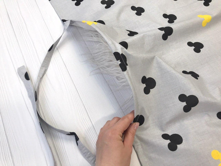 nakidka-dlya-goduvannya-mikki-na-siromu