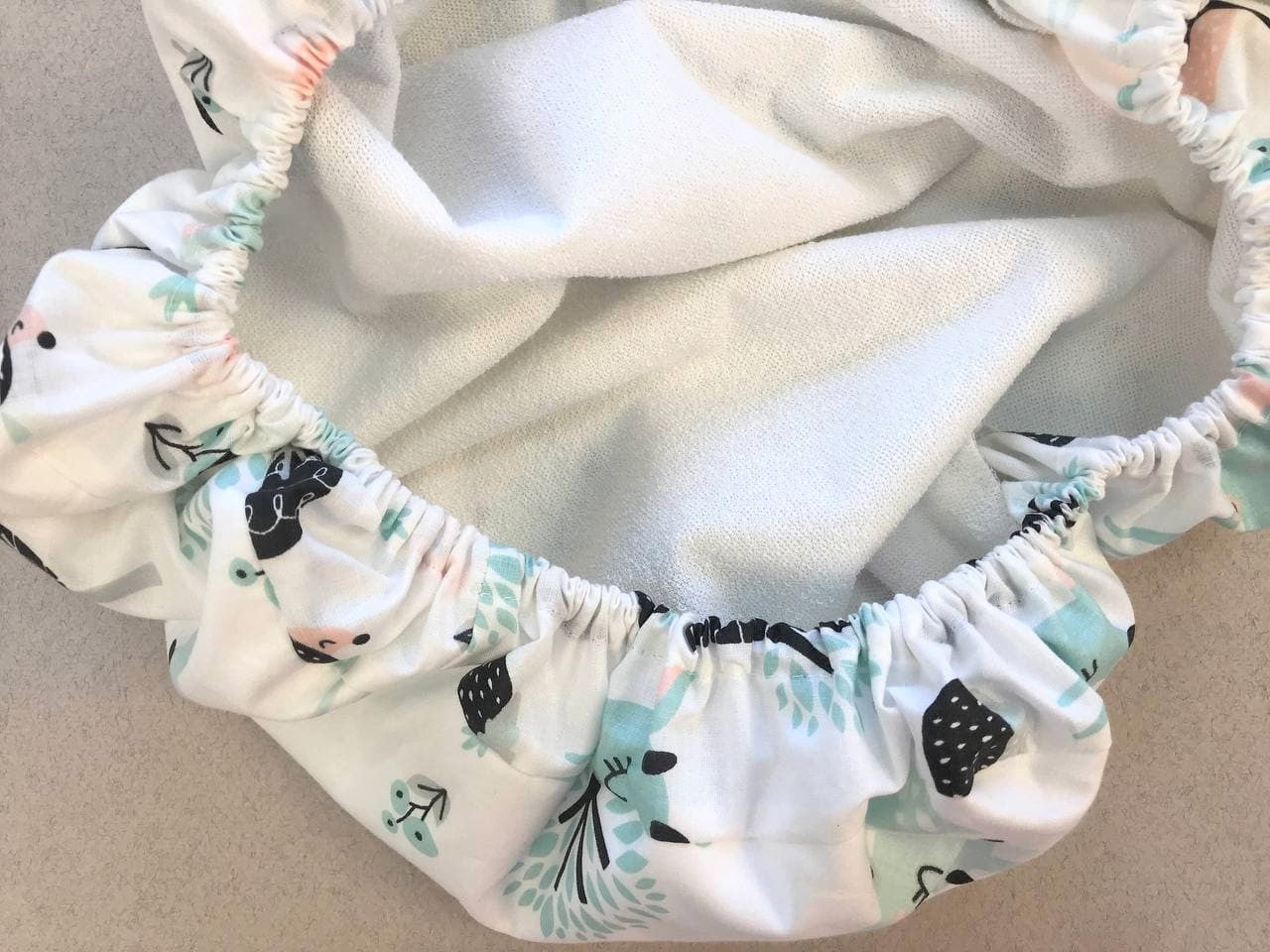 prostyradlo-v-kolyasku-oleni