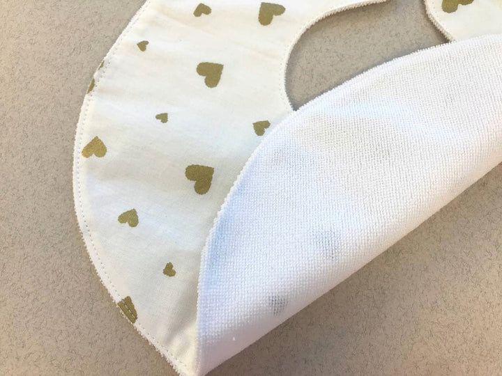 Яскраві дитячі непромокаючі слюнявчики для годування та захисту одягу