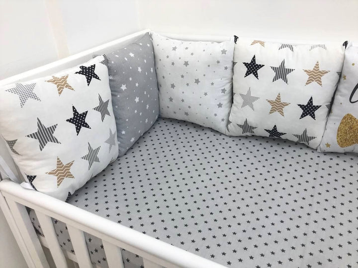 Бортики набори - Комплект м'яких та безпечних бортиків для дитячого ліжечка, що забезпечує захист та комфорт немовляті."