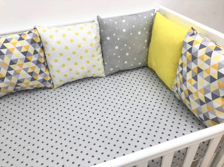 Бортики набори - Комплект м'яких та безпечних бортиків для дитячого ліжечка, що забезпечує захист та комфорт немовляті."