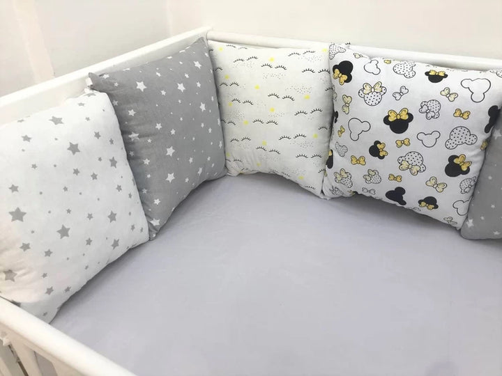 Бортики набори - Комплект м'яких та безпечних бортиків для дитячого ліжечка, що забезпечує захист та комфорт немовляті."