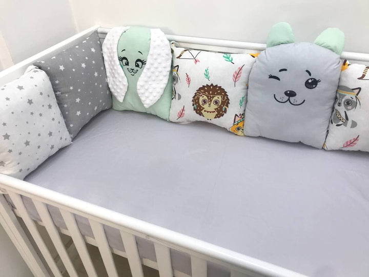 Бортики набори - Комплект м'яких та безпечних бортиків для дитячого ліжечка, що забезпечує захист та комфорт немовляті."
