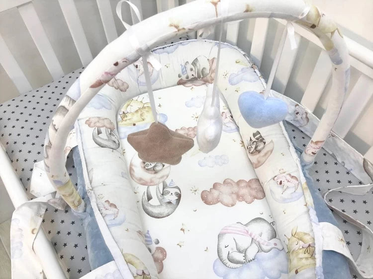 Кокон-мобіль - стильний і зручний дитячий аксесуар для сну