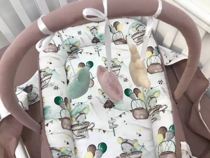 Кокон-мобіль - стильний і зручний дитячий аксесуар для сну